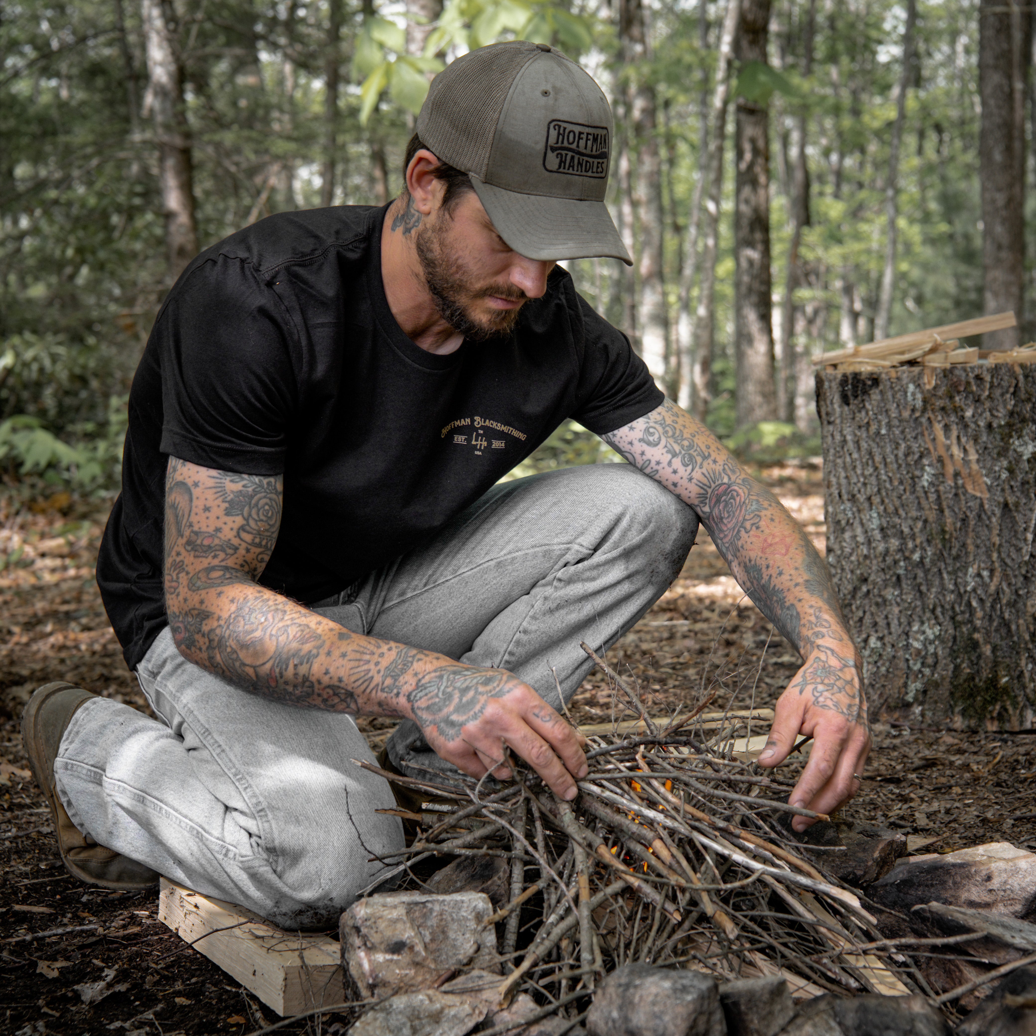 building a fire in the woods with hoffman axe