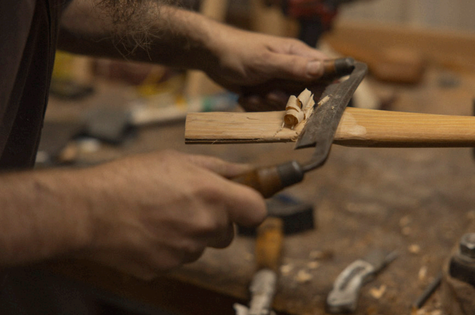 shaping an axe handle with a drawknife