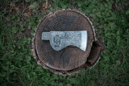 trappers hatchet on a stump