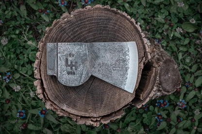 camp axe on stump